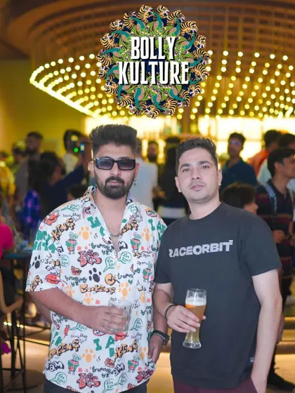 Posing with a friend at Bolly Kulture night.