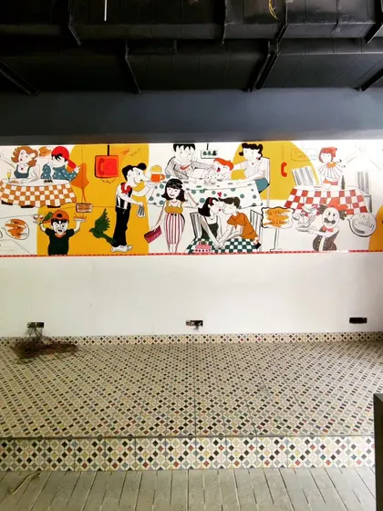 Another full view of the diner mural, showing how it defines the character of the entire room.