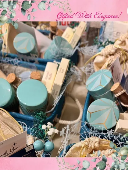 Gifting with elegance is easy with these precious hampers. This image shows two baskets filled with curated items in a lovely blue and white color scheme, perfect for a baby shower or a sophisticated thank you gift.