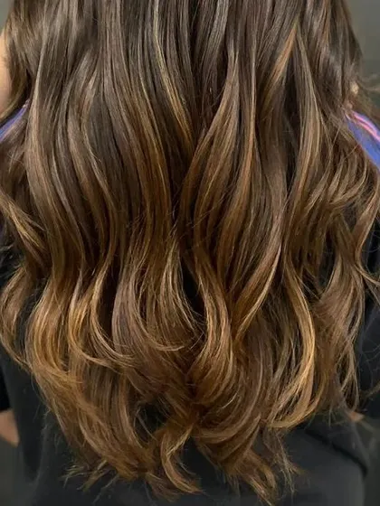 A close-up of the sunlit balayage, showing the beautiful texture and color.