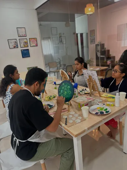 A group of participants enjoying the Koi Fish painting workshop. It's a great way to spend an afternoon, learning and creating in a relaxed environment.