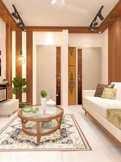 This living room combines various textures and patterns, from the traditional rug to the floral print armchair and the geometric patterns on the door panels, creating a rich, layered look.