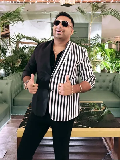 Thumbs up for a great show! This unique blazer reflects my personality: a mix of classic style and unexpected fun.