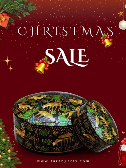 This Kashmiri papier-mâché box features a beautiful jungle motif, hand-painted with incredible detail. It's a perfect decorative piece for storing small treasures.