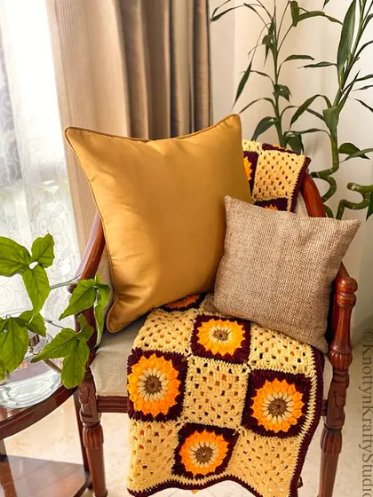 Cozy corners are made of layers. Here, my sunflower throw provides a beautiful, textured base for other cushions.