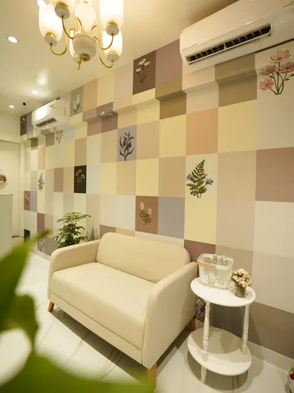 The decor in our waiting area is designed to create a tranquil atmosphere. The soft color palette and botanical details help you relax before your consultation or treatment begins.