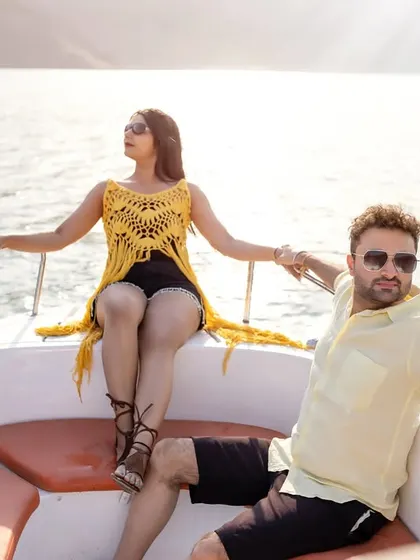 A cool, stylish pose on the speedboat, with the couple looking like stars in their own movie. This captures the fun and glamour of a Tehri pre-wedding shoot.