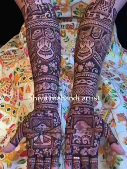A dense and intricate design featuring a variety of traditional patterns and symbols, creating a rich and full look.