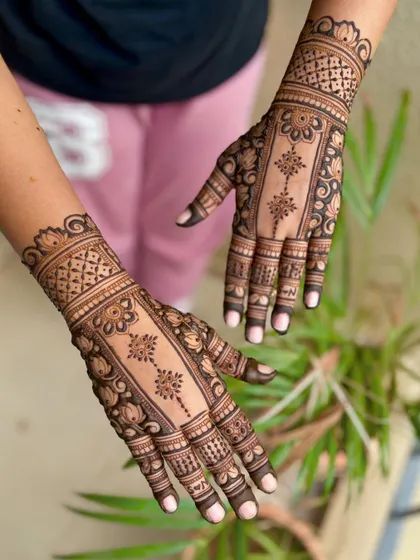 Another perspective of the elegant engagement mehendi, showing the clean lines and symmetry.