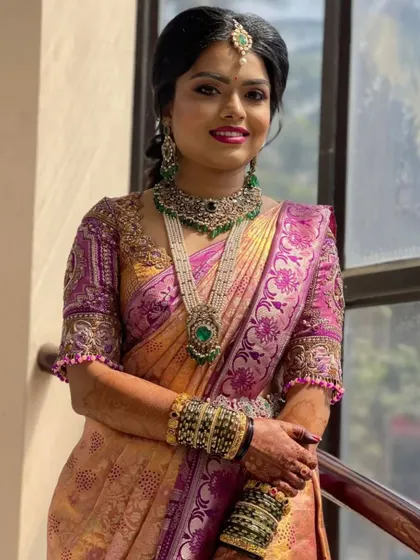 My client chose this gorgeous Victorian-style set with green stones for her reception. It is a unique and elegant choice that stood out beautifully.