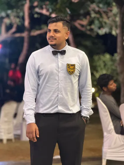 Behind every great fight is a referee with unwavering focus. Here I am dressed for my role as a ring official, ready to ensure a fair and safe competition.