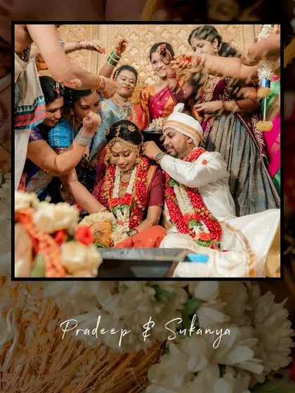 A beautiful shot of the couple surrounded by family during a wedding ritual.