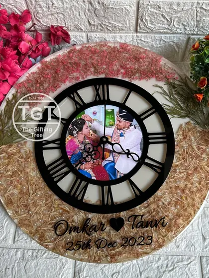 The full 16-inch clock, a statement piece for any wall. It's a beautiful and functional way to celebrate a wedding or anniversary.