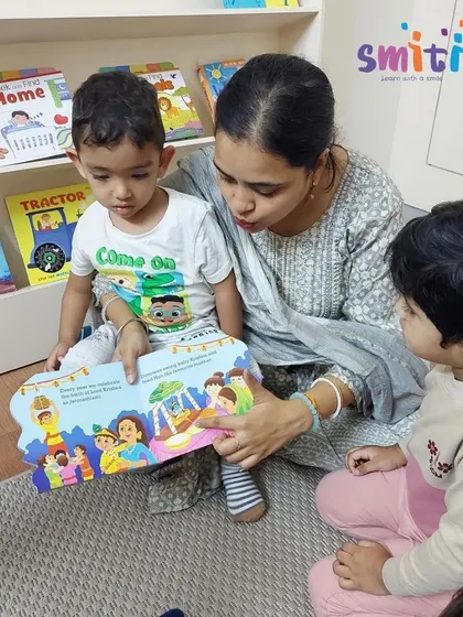 A teacher reads a story about Lord Krishna to our toddlers during Janmashtami. Storytelling is a key part of how we introduce children to cultural tales and festivals.
