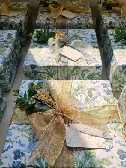 A look at the two different ribbon styles I used for these wedding favors. One is a sheer grey, and the other is a shimmering gold, offering two distinct but equally elegant finishes.
