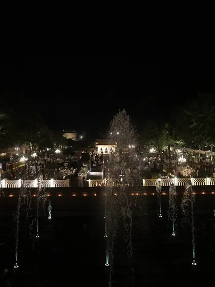 The heritage venue's fountains add to the magical atmosphere of the Retro Sufi night, reflecting the lights of the celebration.