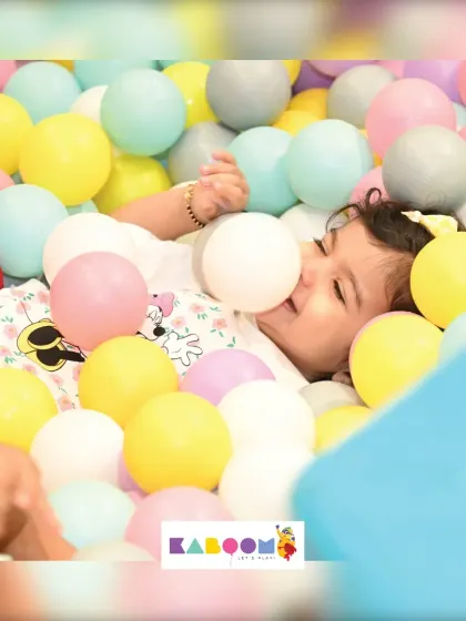 A moment of pure bliss for our tiniest guest in the ball pit. It's a safe and wonderful sensory experience.