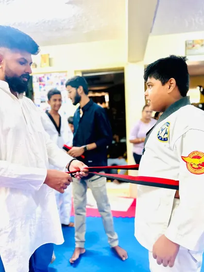 The moment a student's belt changes from red to black.