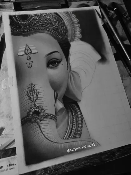 The Ganesha sketch is nearing completion here. The trunk and face are fully shaded, showing the realistic texture before the final details are added to the ear and background.