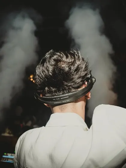 A dramatic shot from behind, with CO2 smoke creating a powerful silhouette. This highlights the theatrical elements I bring to my performances.