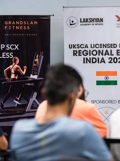 The official banner for the UKSCA Licensed Partner Regional Event India 2024, sponsored by Grandslam Fitness, displayed at our academy.