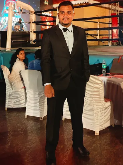Dressed up and ready for a boxing event. It's an honor to be part of the professional boxing world and contribute to its growth.