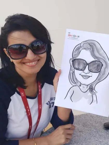 Even with sunglasses on, I can capture a great likeness! This was a fun, quick sketch done at an outdoor corporate event.