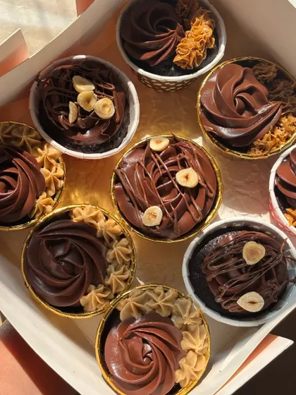 A box of our 85-calorie cupcakes offers all the flavor with none of the regret. You can choose up to 3 flavors in a box of 9, including Dark Chocolate, Noir Nutella, and Cookie Butter.