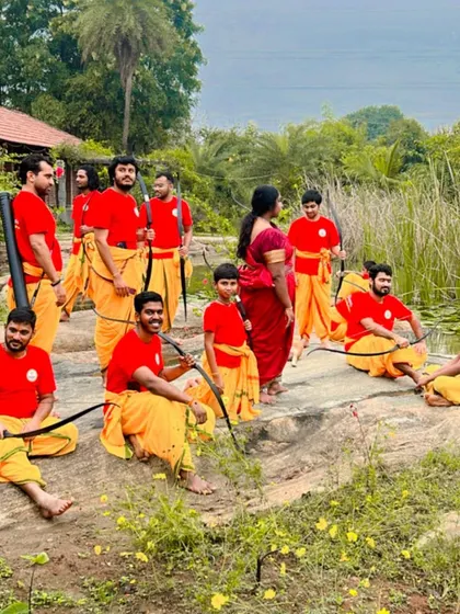 Graduates of a 5-day camp relax in a natural setting after their training. The Gurukul experience fosters a deep bond with nature and with fellow students.