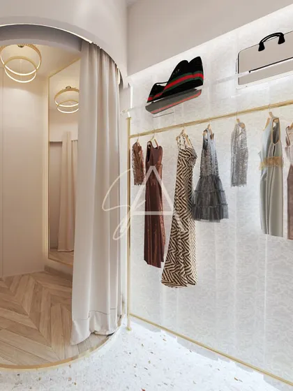 The trial room area in the 'Beige Bag' boutique. An arched entrance with a soft curtain leads to a private space with herringbone wood flooring, creating a warm and exclusive feel for customers.