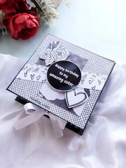A stylish black and white mini scrapbook, made for an amazing sister's birthday.