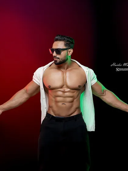 Got my back. A powerful shot from a recent photoshoot, showing the results of consistent training.