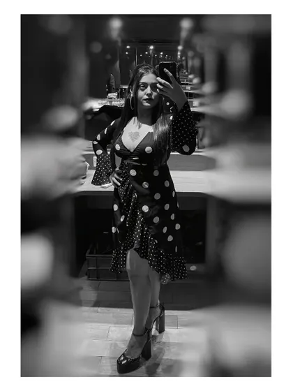 A black and white selfie showing off my retro-soul look for a gig. The polka dots and heels felt perfect for a night of jazz and R&B.