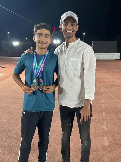 Yuv with his coach, celebrating his comeback and multiple wins, a true story of resilience.
