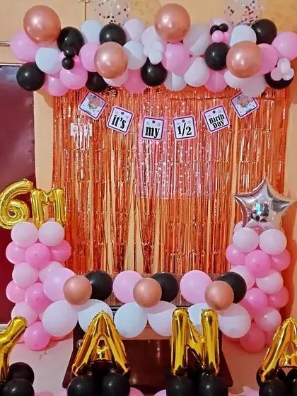Full view of the half-birthday balloon backdrop.