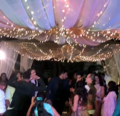 A wide shot of the elegantly decorated wedding venue.