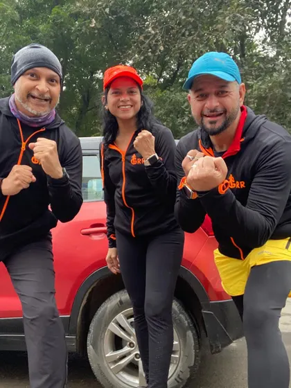 Three of our runners in GRR jackets, braving the winter chill. Progress doesn't take breaks for the weather.