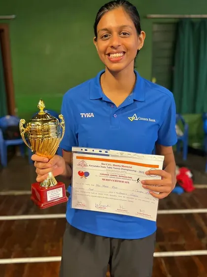 Maria Rony, our Women's State Champion, with her trophy and certificate.