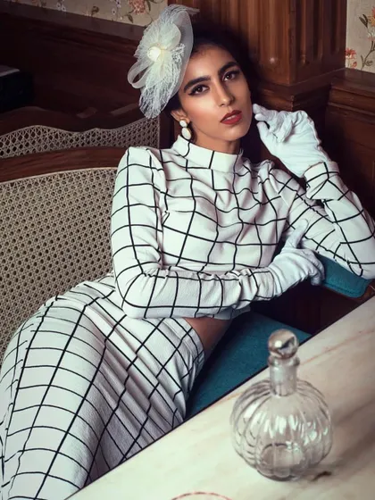 A series from a vintage-themed shoot. I mixed different textures and patterns, like a denim crop top with checkered pants and a floral dress, to create a retro-inspired story with a modern twist.
