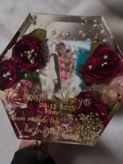 This hexagonal block is a perfect example of preserving deep red roses. The flowers hold their shape and color beautifully, creating a dramatic and romantic frame for the couple's wedding photo and a personalized quote.