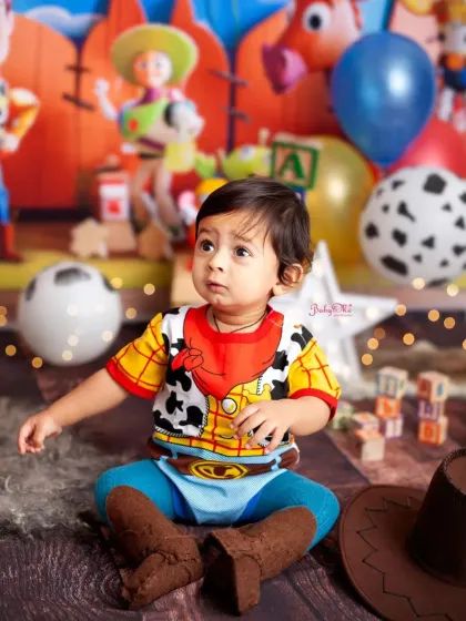 Dressed head to toe as Woody, this little guy is just the cutest. I have a variety of costumes to make our themed shoots extra special.