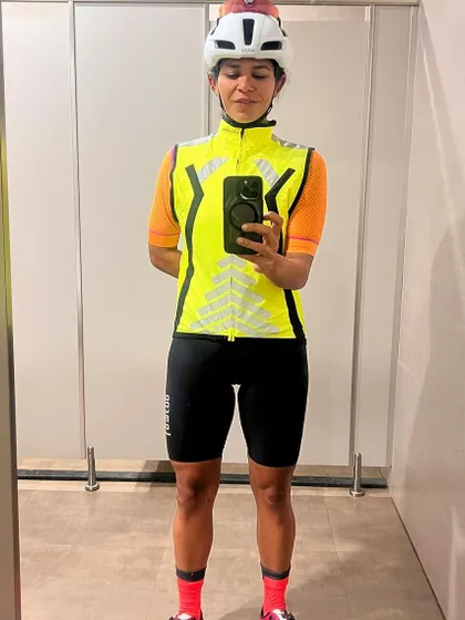 A selfie in my high-visibility vest before a ride. Safety is always the top priority.