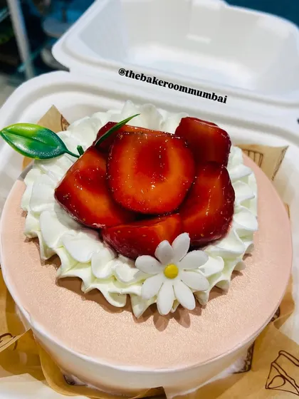 A cute and pretty Strawberry Bento Cake, perfect for the Christmas season or any celebration. It's topped with fresh strawberries and delicate sugar flowers.