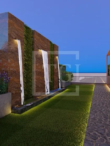 A render of a modern water feature designed for a terrace in New Delhi. The cascading water, flanked by vertical gardens and set against a wood-paneled wall, adds a soothing and luxurious element to the outdoor space.