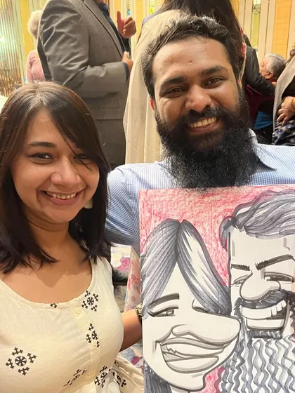 The smiles on their faces say it all. I really enjoyed drawing this fun couple at an event at the Sheraton Grand in Pune.