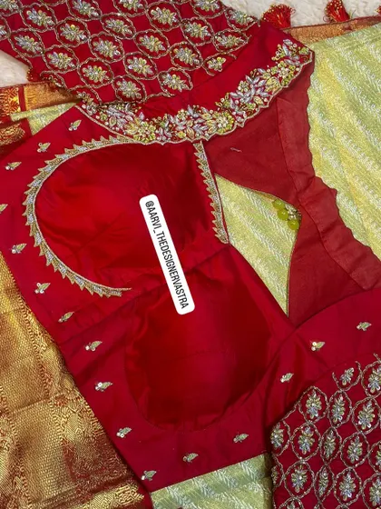 Another view of the red bridal blouse, showing the beautiful neckline and the rich embroidery work.