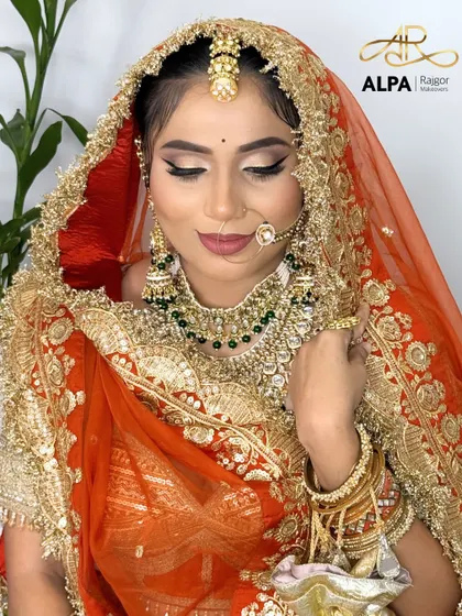 A moment of quiet reflection, showing the soft glam of the eye makeup and the smooth finish of the base.