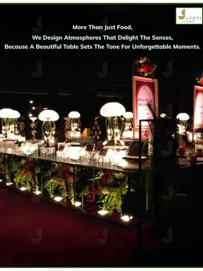 A modern royal theme featuring a mirrored buffet counter with unique mushroom-shaped lamps and deep red floral accents, creating a sophisticated and moody ambiance.