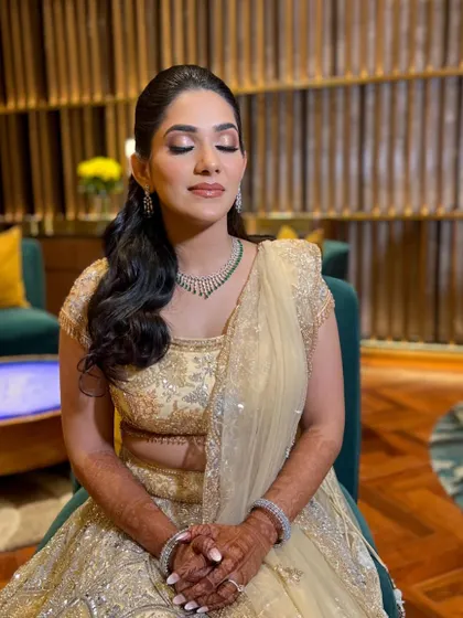 Eyes closed, you can see the beautiful gold and bronze tones on her eyelids.