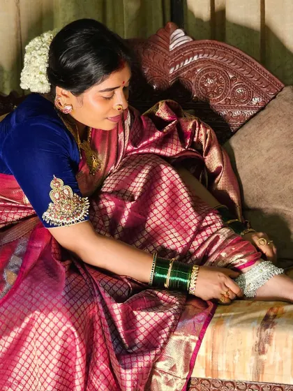 Getting ready for a festival, putting on my silver anklets. For me, every part of dressing up traditionally is a ritual in itself, a way of honoring the occasion.